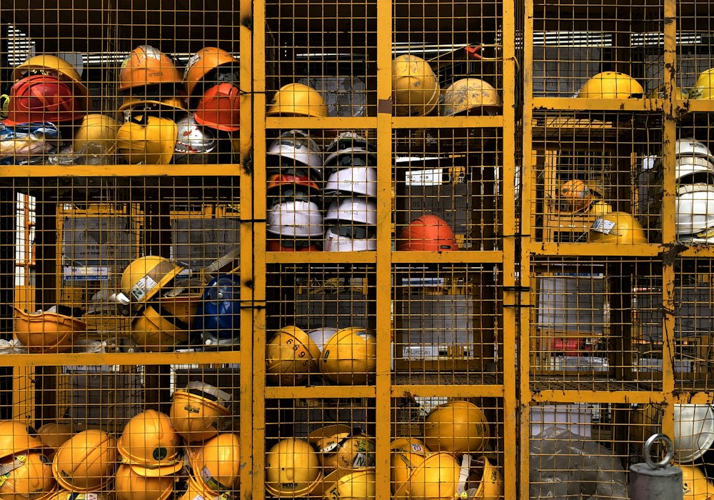 Site supervisor wearing a safety helmet and high-visibility vest